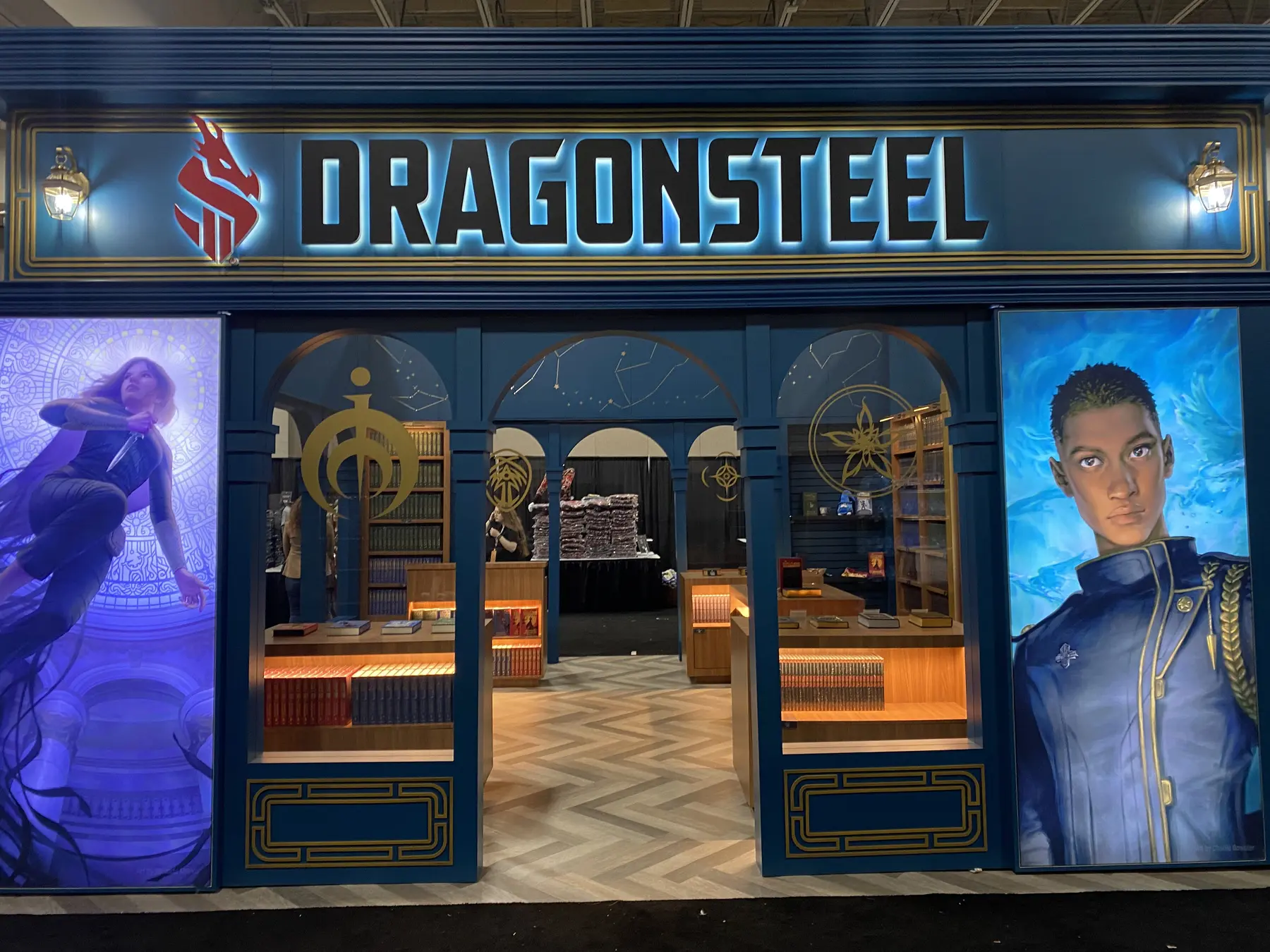 Dragonsteel exhibit entry with branded fascia and illuminated character graphics